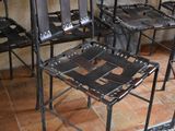 six chairs that are sitting in a row on the floor