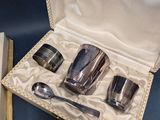 a box with silverware in it sitting on a table