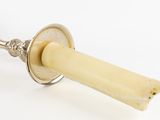 an image of a candle holder with a candle inside of it
