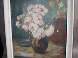 une image d'un tableau de fleurs dans un vase sur une table