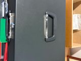 a black box with a lock on it in a room
