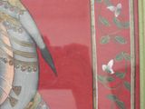 a picture of a painting of an elephant on a red background