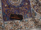 an image of a close up of a scarf with a tag on it