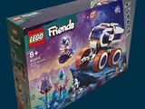 a box of lego friends set with a space vehicle