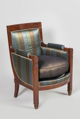 an image of a chair with a striped upholstered seat