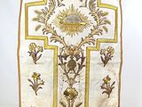 an image of a priest ' s stole with a cross on it