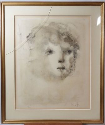 an image of a drawing of a woman ' s face in a gold frame