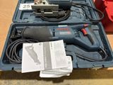 a box with tools in it sitting on a table
