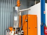 une machine qui se trouve à l'intérieur d'un bâtiment