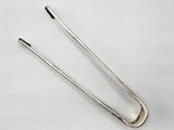 pair of silver plated hair pins on a white background