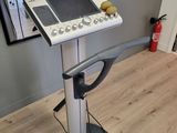 a machine that is sitting on a stand in the room