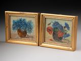 pair of paintings of flowers in a vase on a table