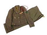 an image of a military jacket and pants on a white background