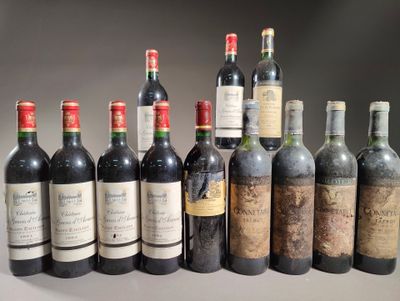 plusieurs bouteilles de vin sont alignées sur une table