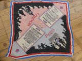 a picture of a world war ii scarf on a wooden floor