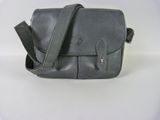 leather cross body bag with adjustable shoulder strap and snap closure