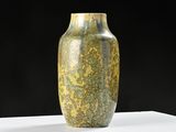 a vase that is sitting on a white table