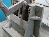 a machine that is working on a piece of metal