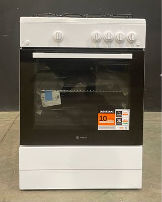 a white stove that has a price tag on it