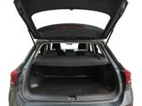 the back of a car with its trunk open showing the trunk space