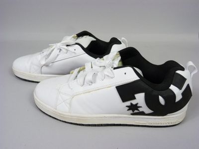 converse shoes with black and white stars on the side