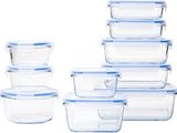 un lot de récipients en verre avec leurs couvercles, sur fond blanc