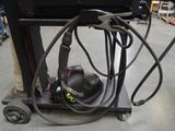 a machine that is sitting on top of a cart