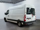 a picture of a white van parked in a garage