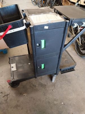an image of a cart with a box on it in a garage
