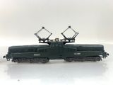 a toy train that is sitting on a white surface