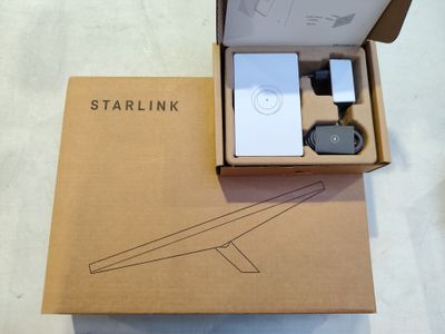 a cardboard box with an electronic device inside of it