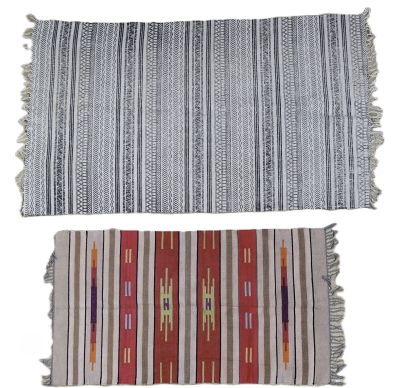 two different rugs with fringes and fringes on them