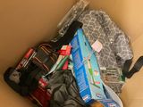 a box full of items that are sitting on the floor