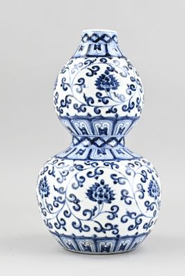 blue and white double gourd vase with floral design