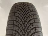 a close up of a tire on a white surface