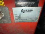 a sign on the side of a machine that says ben mullerer
