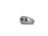 silver ring with black heart and white diamonds on it on a white surface