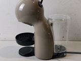 a coffee maker that is sitting on a table