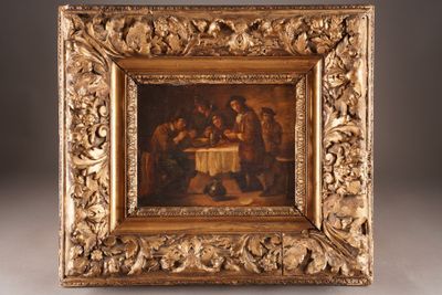 painting of a group of people sitting around a table in a gold frame