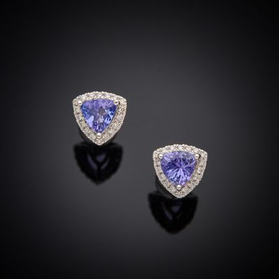 a pair of tanzanite and diamond earrings