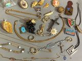 many different types of jewelry on the table