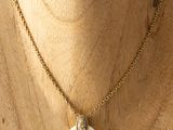 a close up of a necklace on a mannequin mannequin mannequin mannequin mannequin mannequin mannequin mannequin
