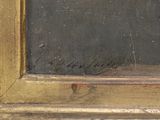 a cat that is sitting in a gold frame
