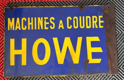 un panneau bleu et jaune sur lequel on peut lire « Machines A Courre Howe »