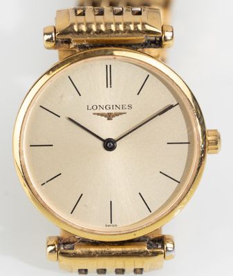 LONGINES Montre-bracelet de dame en métal doré, modèle "La g…