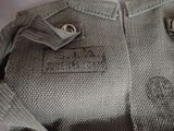 a close up of a jacket with buttons on it
