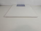 an image of a white book sitting on top of a white table