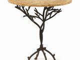 a small table with a tree design on top of it