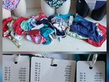 many different types of bikinis on display in a store