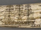 an image of a whale tooth with a ship on it